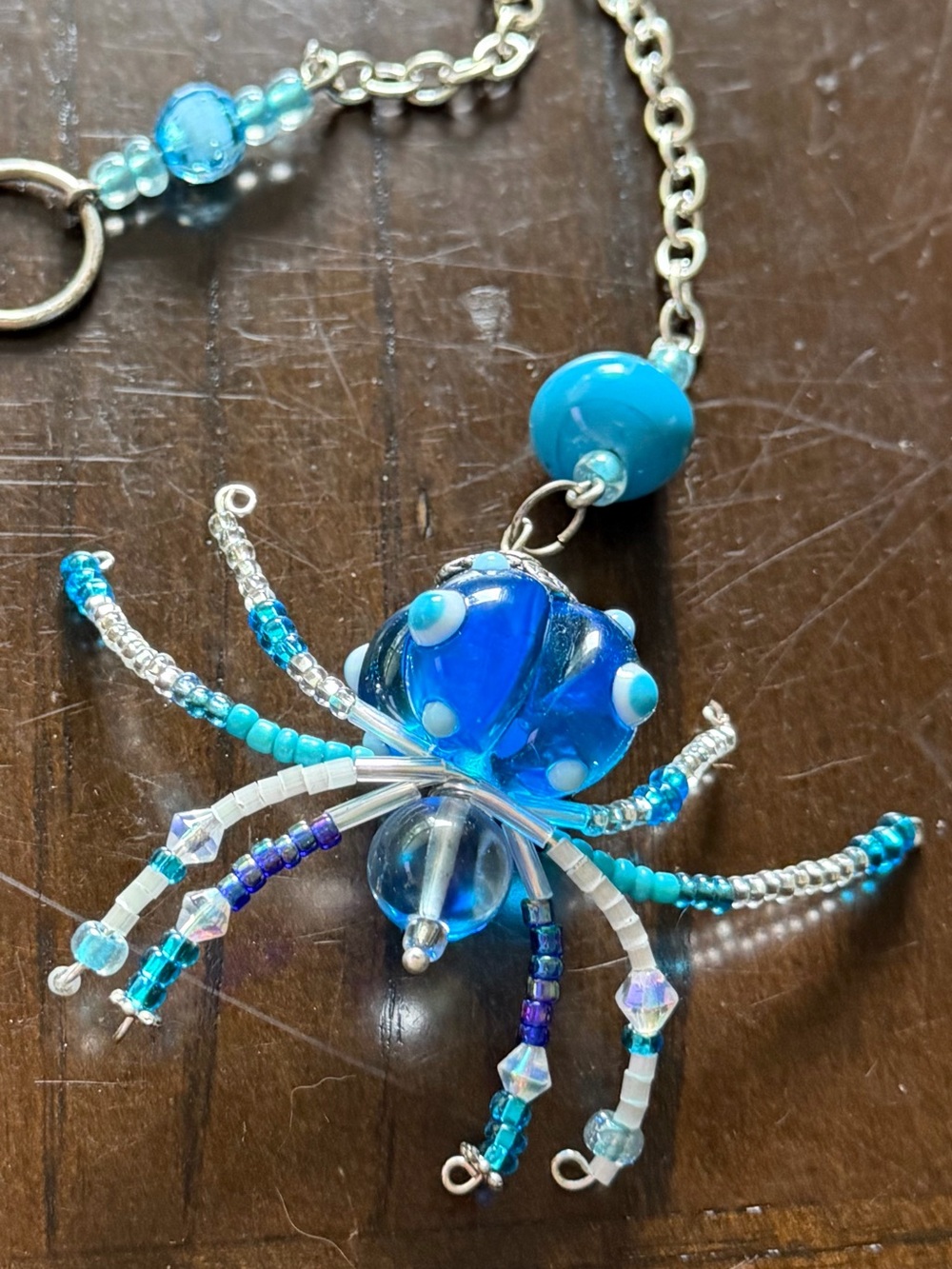 Blue Glass hand beaded spider window hanger or decor.